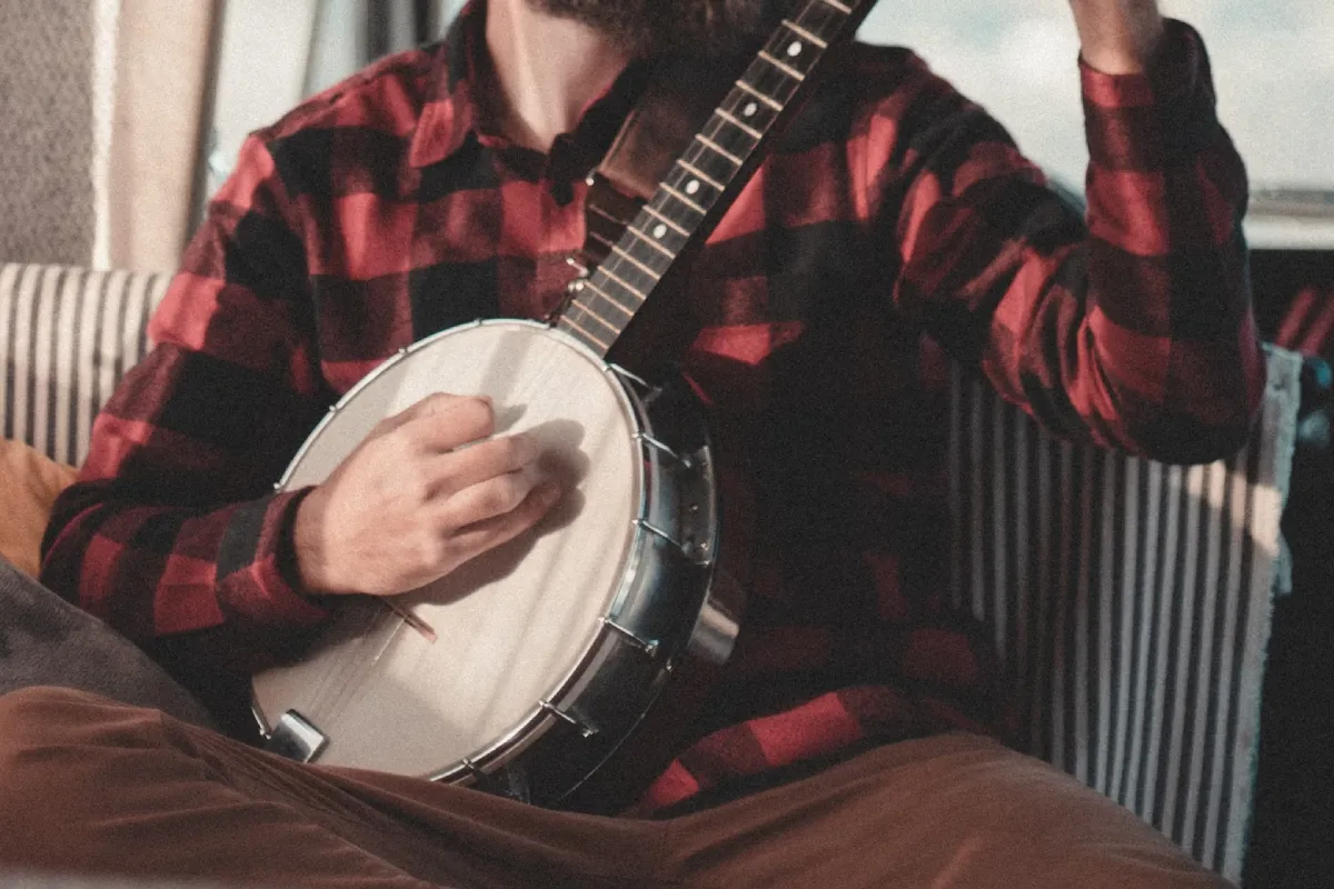 A man playing a banjo